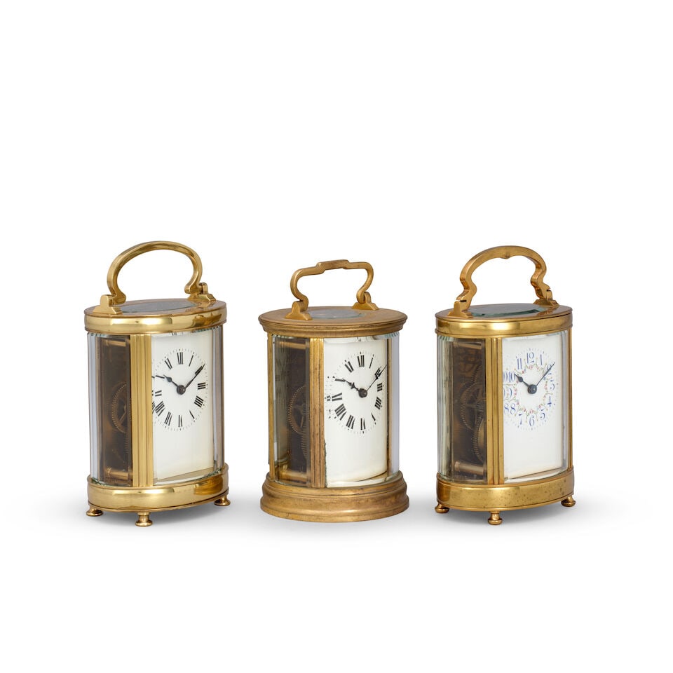 A collection of three early 20th-century oval-shaped French carriage clocks - 3