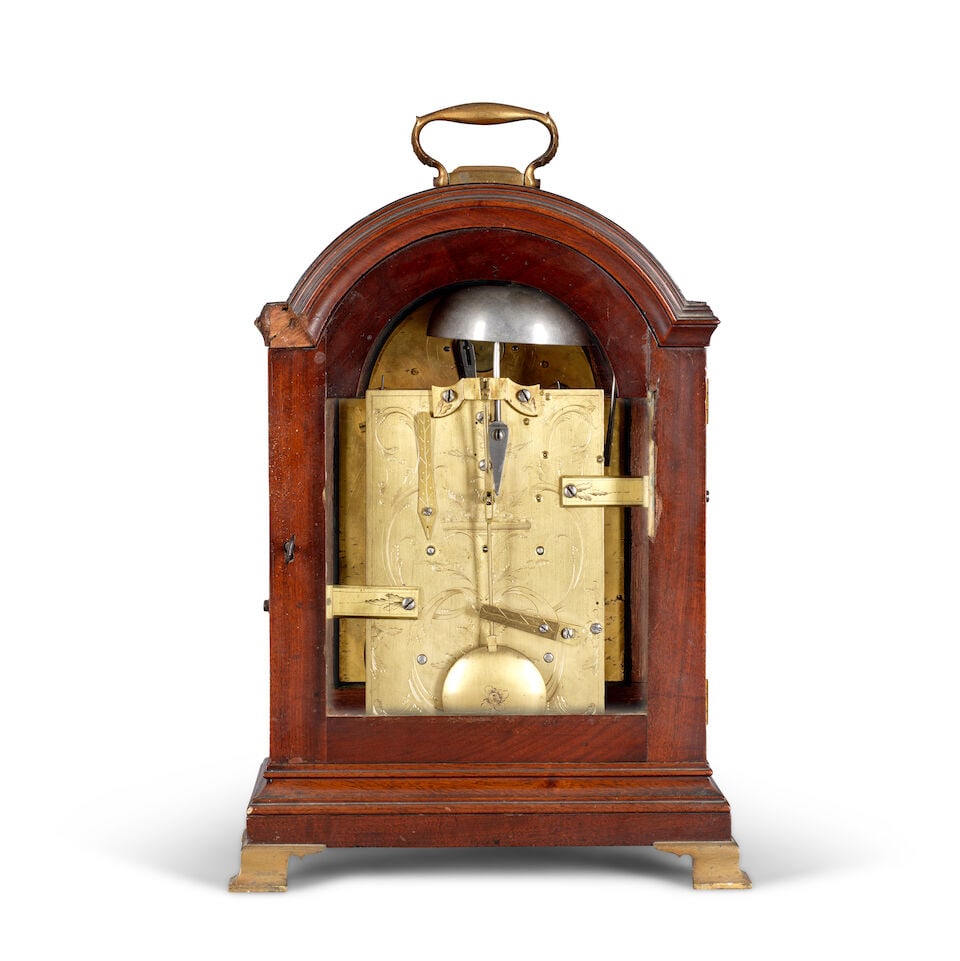 A mahogany break arch table clock with verge escapement Perigal, London - 2