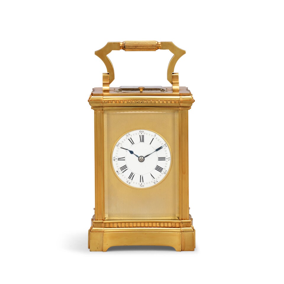 A good early 20th century striking and repeating carriage clock with original leather travel cas... (1 of 5)