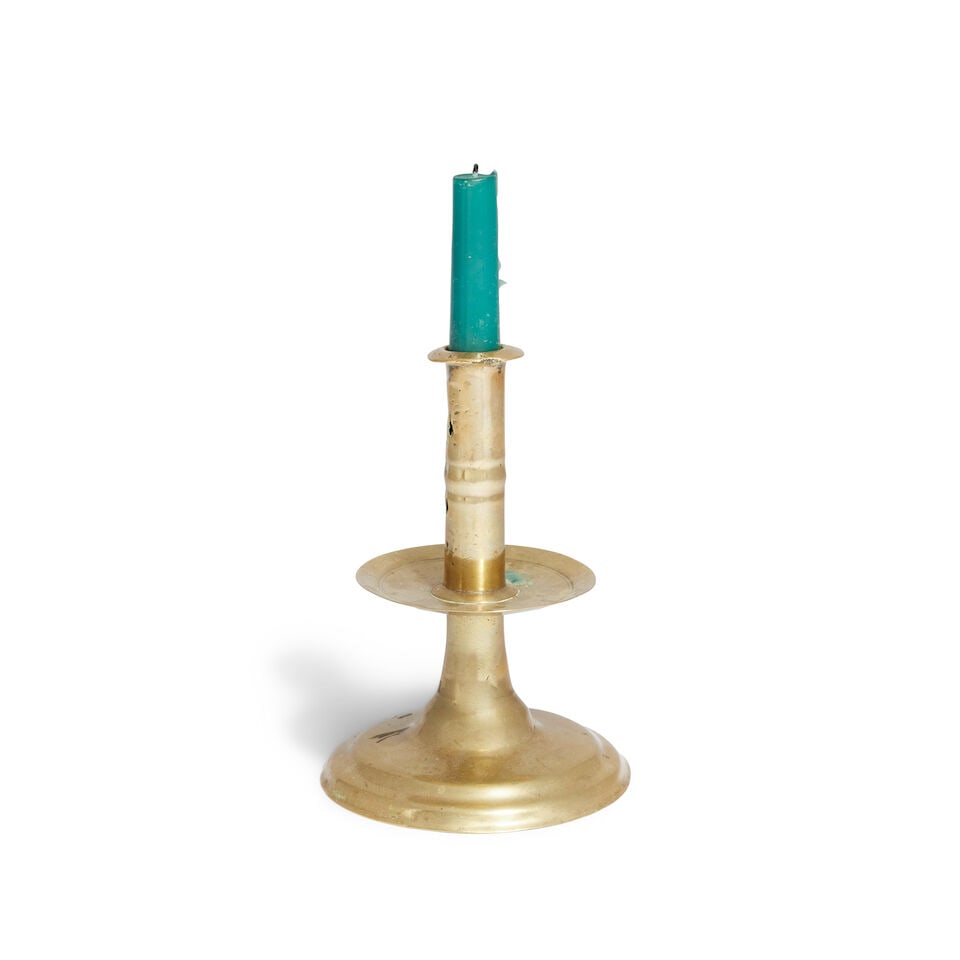 An early brass trumpet candlestick Probably late 17th century (1 of 1)