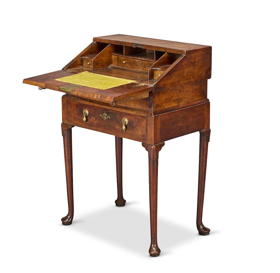 A small walnut and featherbanded bureau on stand Apparently largely George I period (1710-1725),... - 2