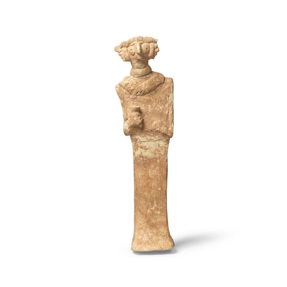 A Near Eastern-style terracotta figure of an idol (1 of 3)