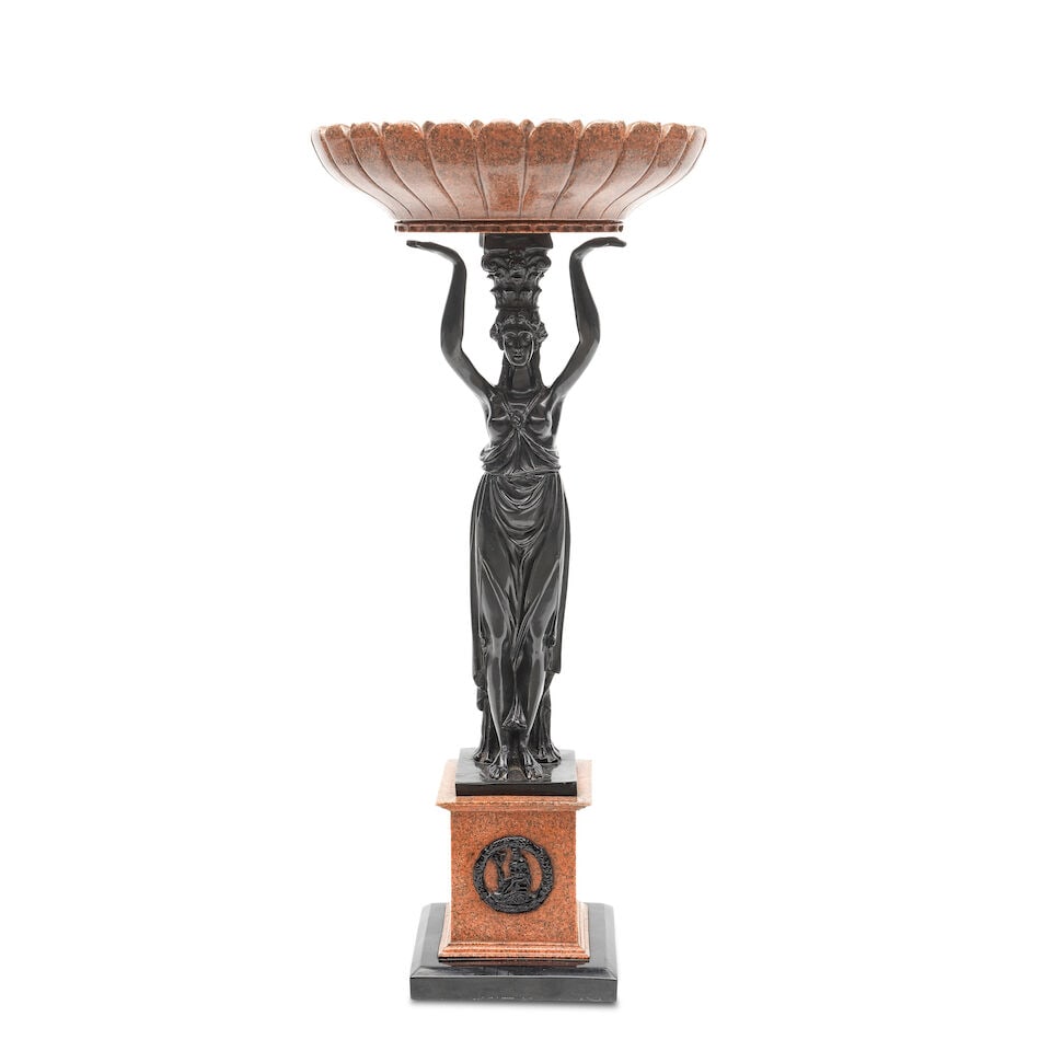 A bronzed resin and simulated pink granite figural tazza In the Empire taste (1 of 3)