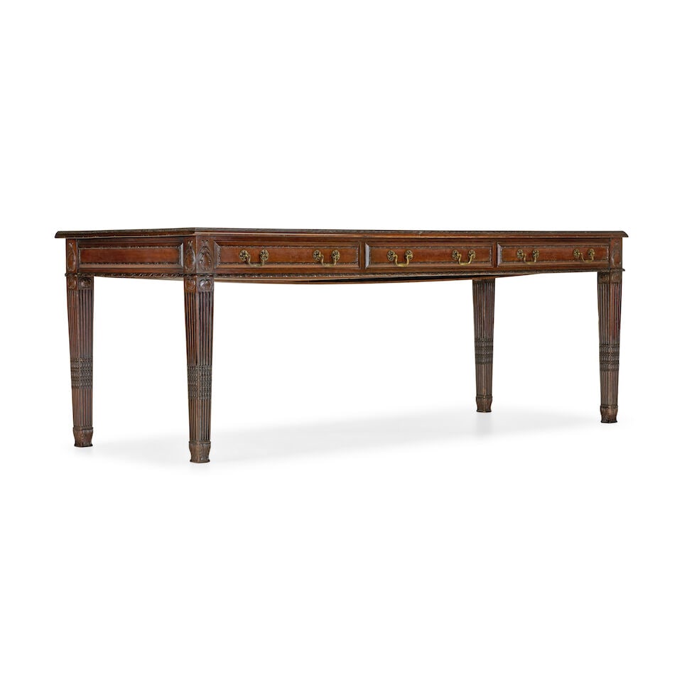 A mid Victorian mahogany library table of long proportions by Howard and Sons Circa 1880, in the... - 2
