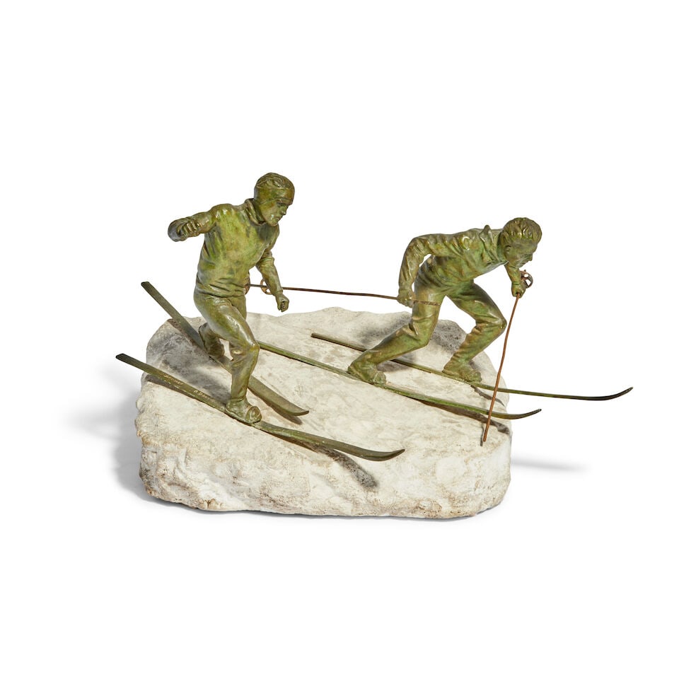 An early 20th century French patinated bronze model of two skiers signed R. David (1 of 2)