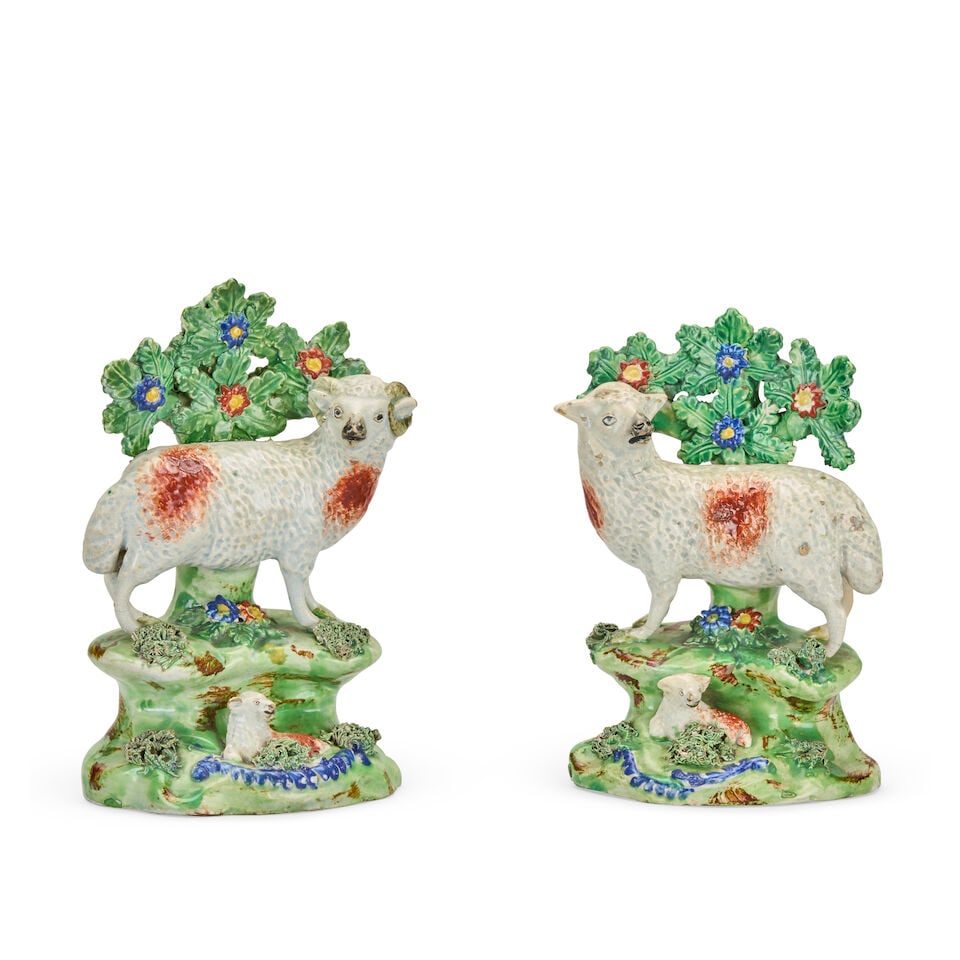 A pair of early 19th century Staffordshire pearlware models of a ewe and a ram By John Walton, ... - 2