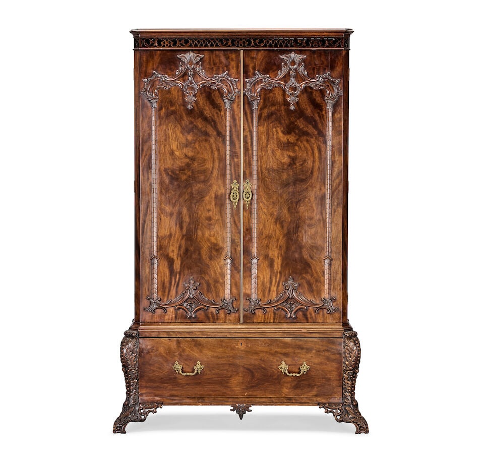 An Edwardian or early 20th century Chippendale revival mahogany wardrobe1905-1925, after a 'Dire... (1 of 2)