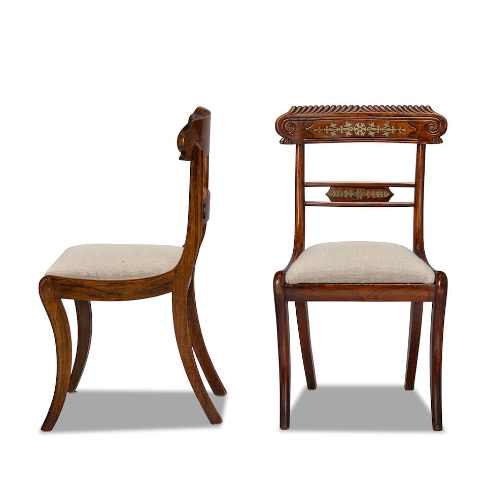 A matched set of twelve simulated rosewood and brass inlaid dining chairs Nine chairs: Regency (... - 2