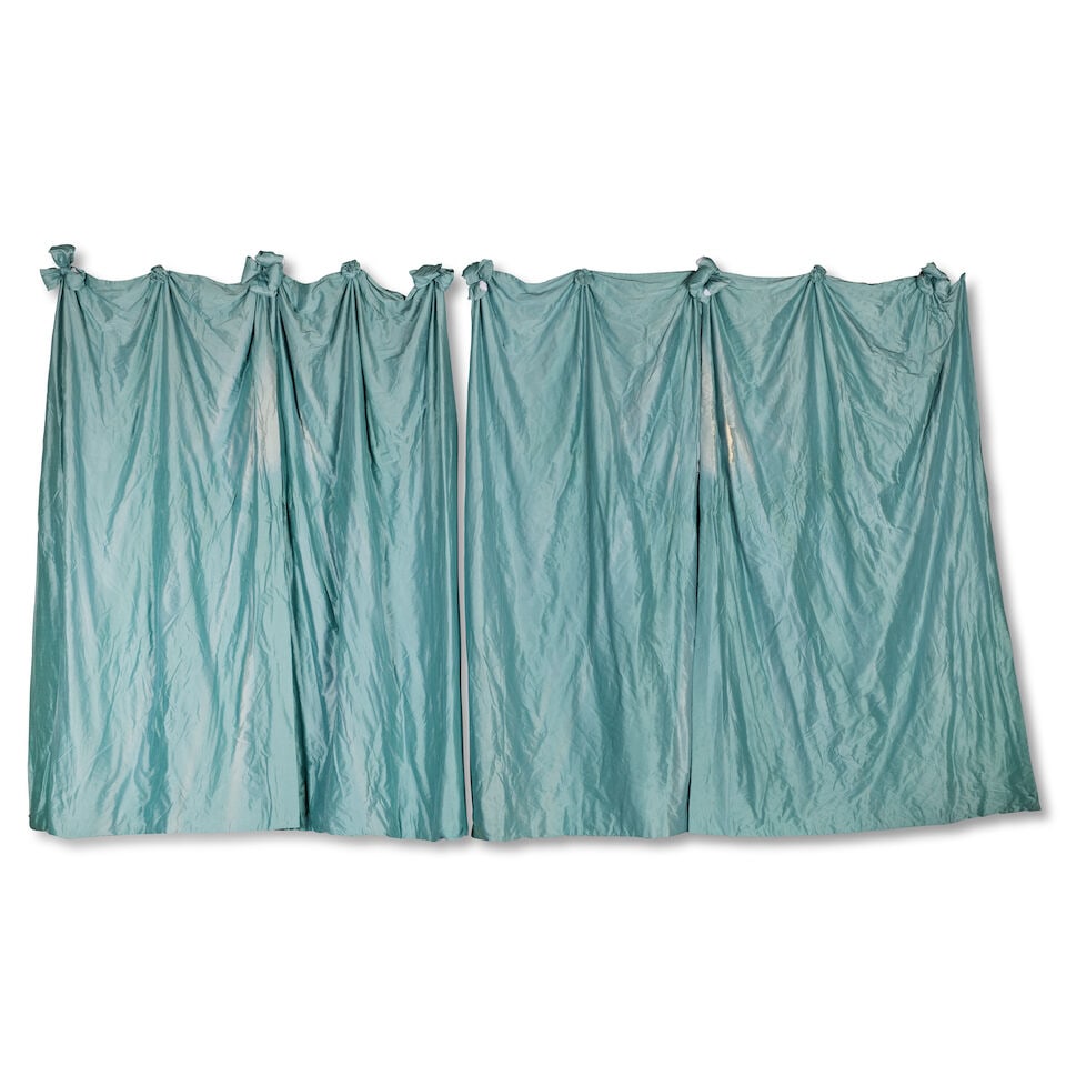 A set of part silk azure and turquoise dress curtains 20th century 259cm drop, the base of one w...: A set of part silk azure and turquoise dress curtains 20th century Comprising four pairs, decorated to the top edge with ribbon ties, all lined, with hooks, adjoined at the centre, 259cm drop, the
