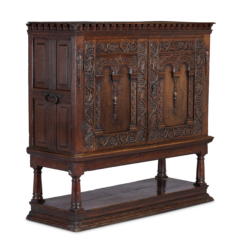 An oak 'Estate' cupboard on stand Parts 17th century, but largely later in date (1 of 4)