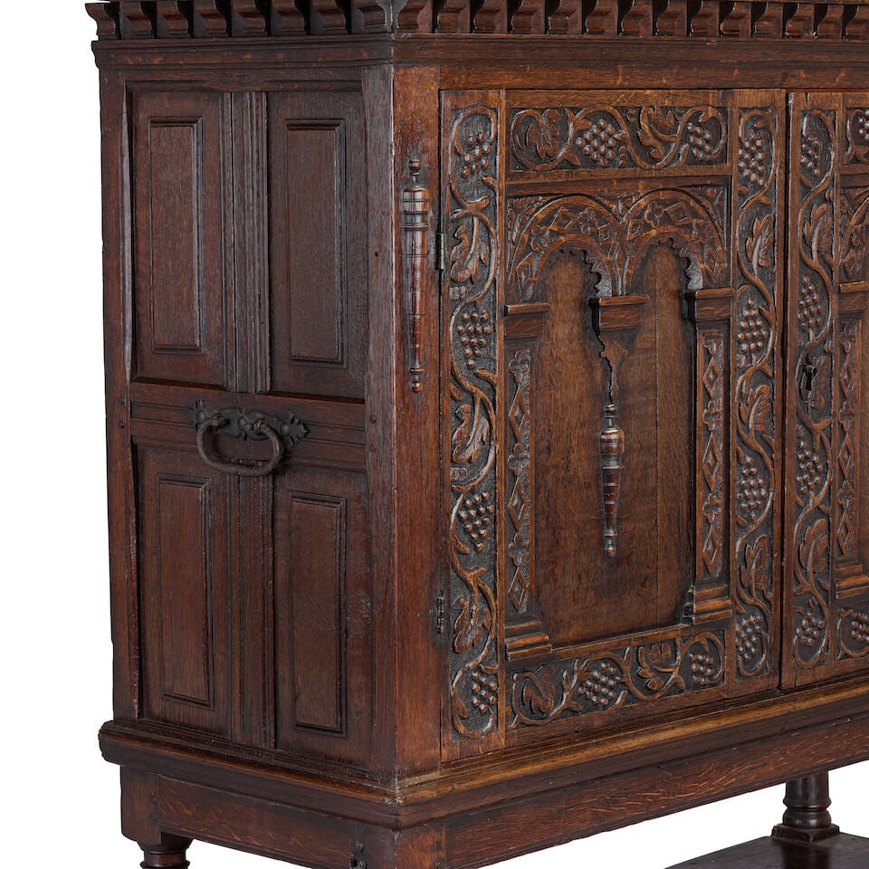 An oak 'Estate' cupboard on stand Parts 17th century, but largely later in date - 2