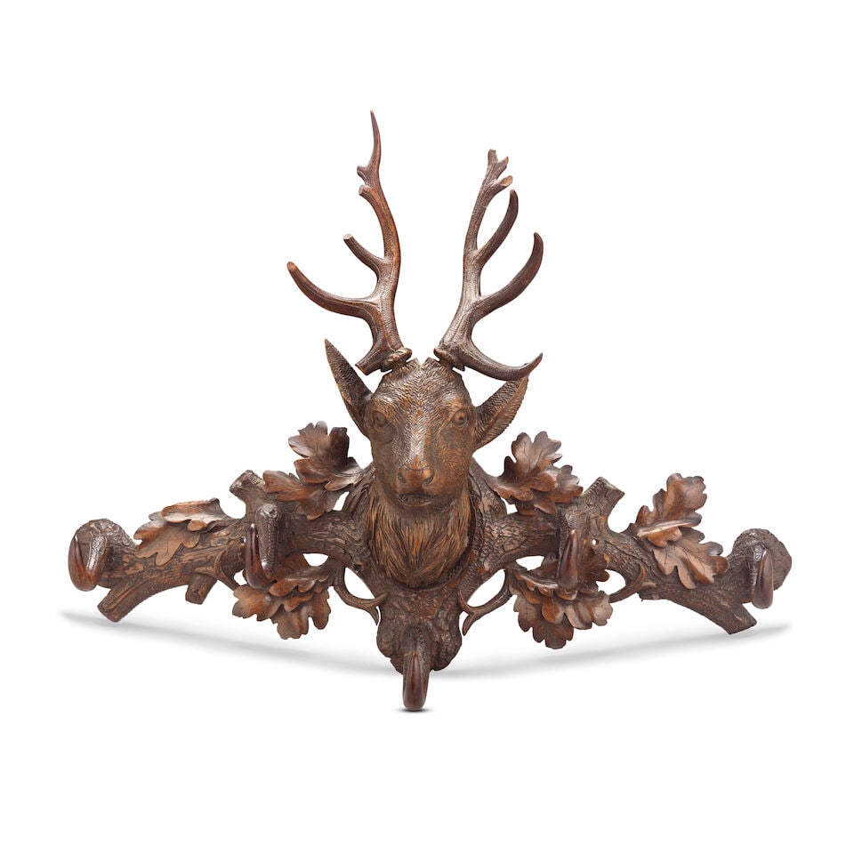 A late 19th/early 20th century Black Forest carved and stained wood stags head coat and hat rack (1 of 3)