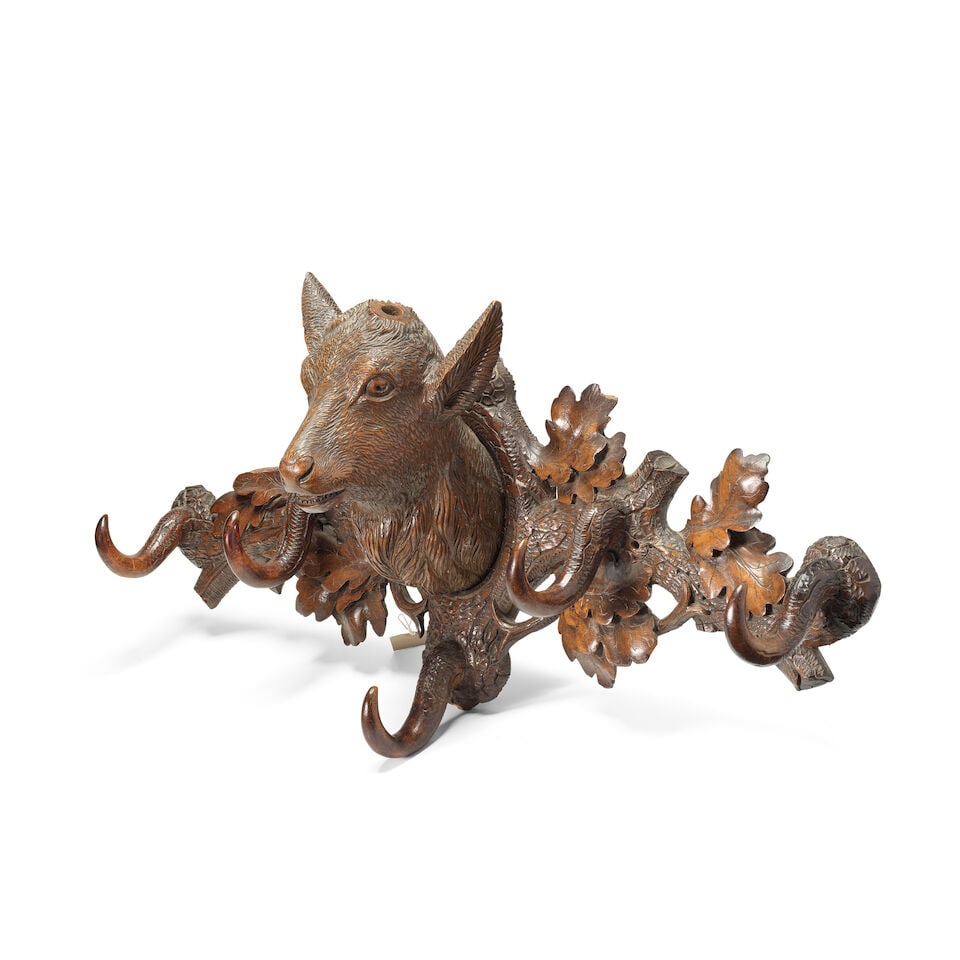 A late 19th/early 20th century Black Forest carved and stained wood stags head coat and hat rack - 2