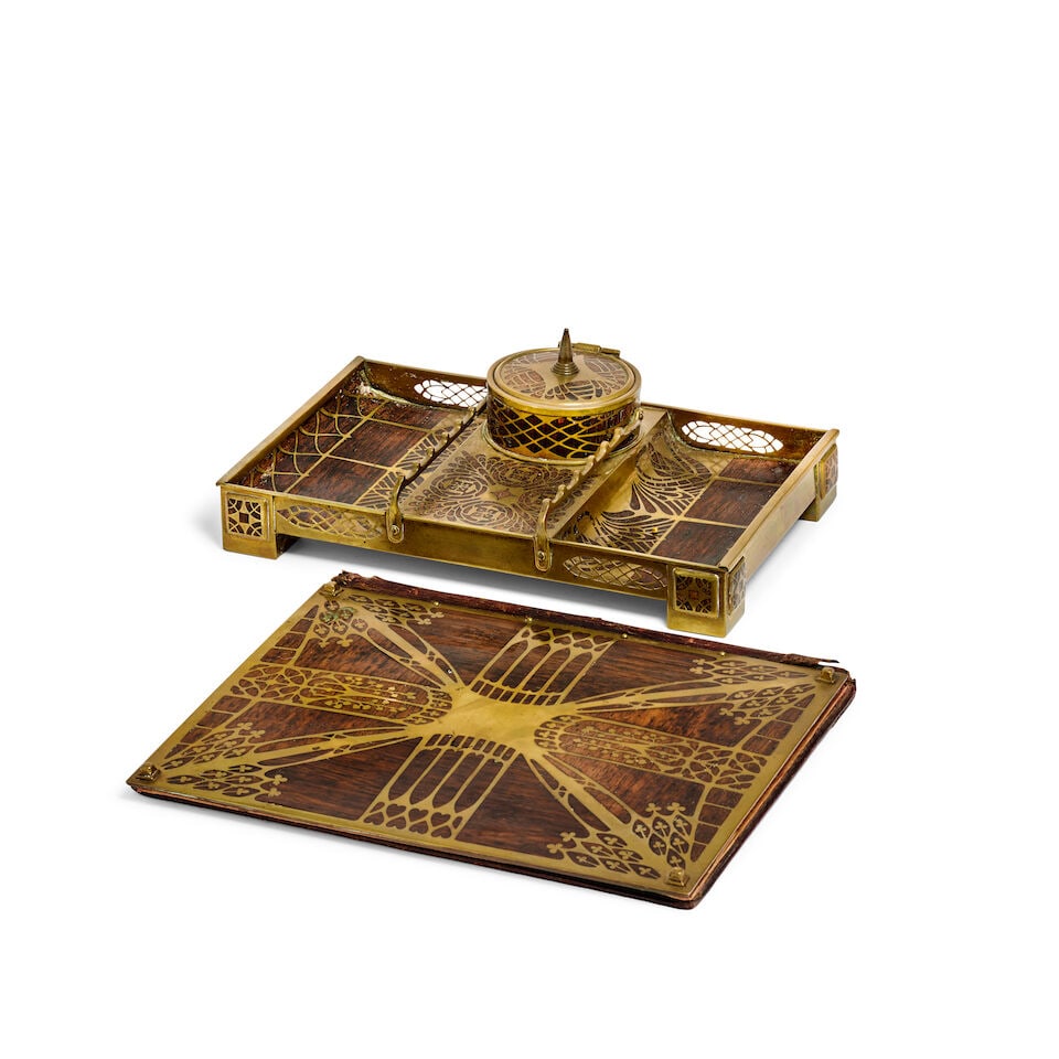 An early 20th century Austro-Hungarian Secessionist style rosewood and brass inlaid inkstand tog...: An early 20th century Austro-Hungarian Secessionist style rosewood and brass inlaid inkstand together with a similar blotter cover Each with stylised foliate and interlaced decoration, the inkstand