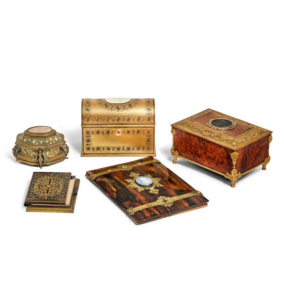 A gilt metal mounted amboyna and bronzed electrotype jewellery casket, an engraved brass and ivo... (1 of 1)