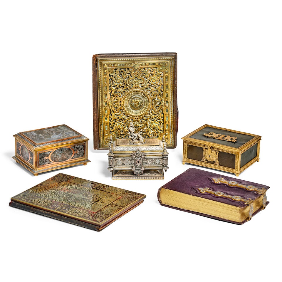 A brass mounted leather playing card case, a gilt bronze mounted leather covered jewellery caske... (1 of 1)