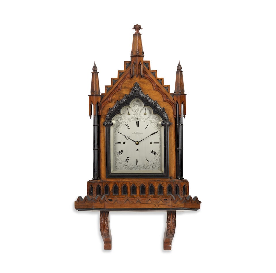 A late 19th century gothic revival mahogany quarter chiming bracket clock and bracket E. White, ... (1 of 2)