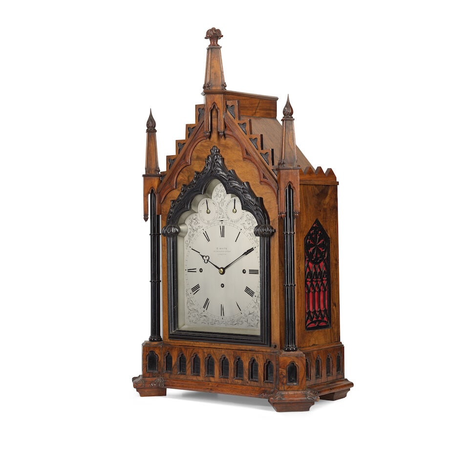 A late 19th century gothic revival mahogany quarter chiming bracket clock and bracket E. White, ... - 2