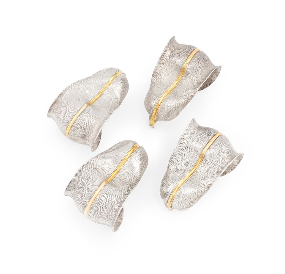 A cased set of four silver and silver-gilt novelty 'feather' napkin holders Garrard & Co Ltd, Lo... - 2