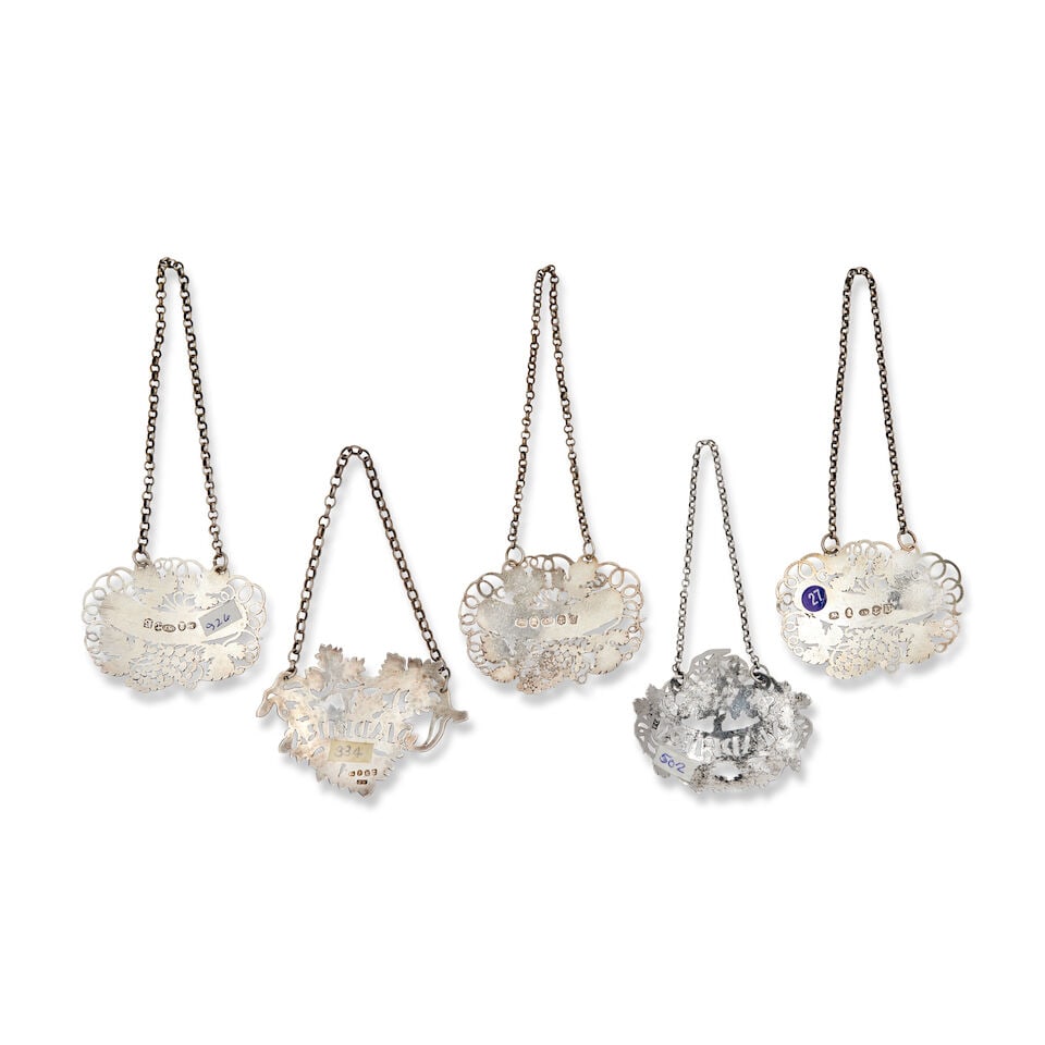 A collection of thirteen silver vine leaf MADEIRA labels and other alternative titles various ma... - 2