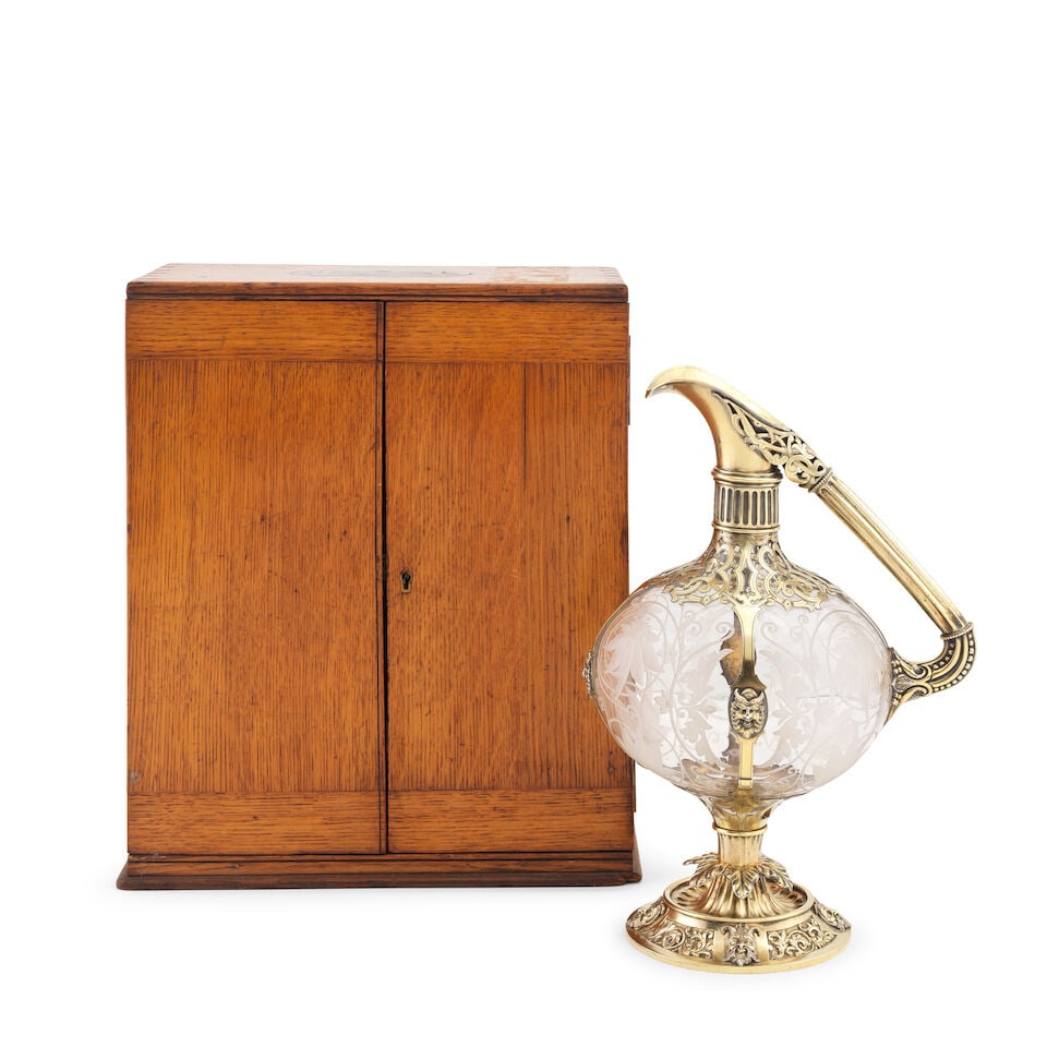 A cased unusual Victorian silver-gilt mounted glass claret jug Edward H Stockwell, London 1872 - 2