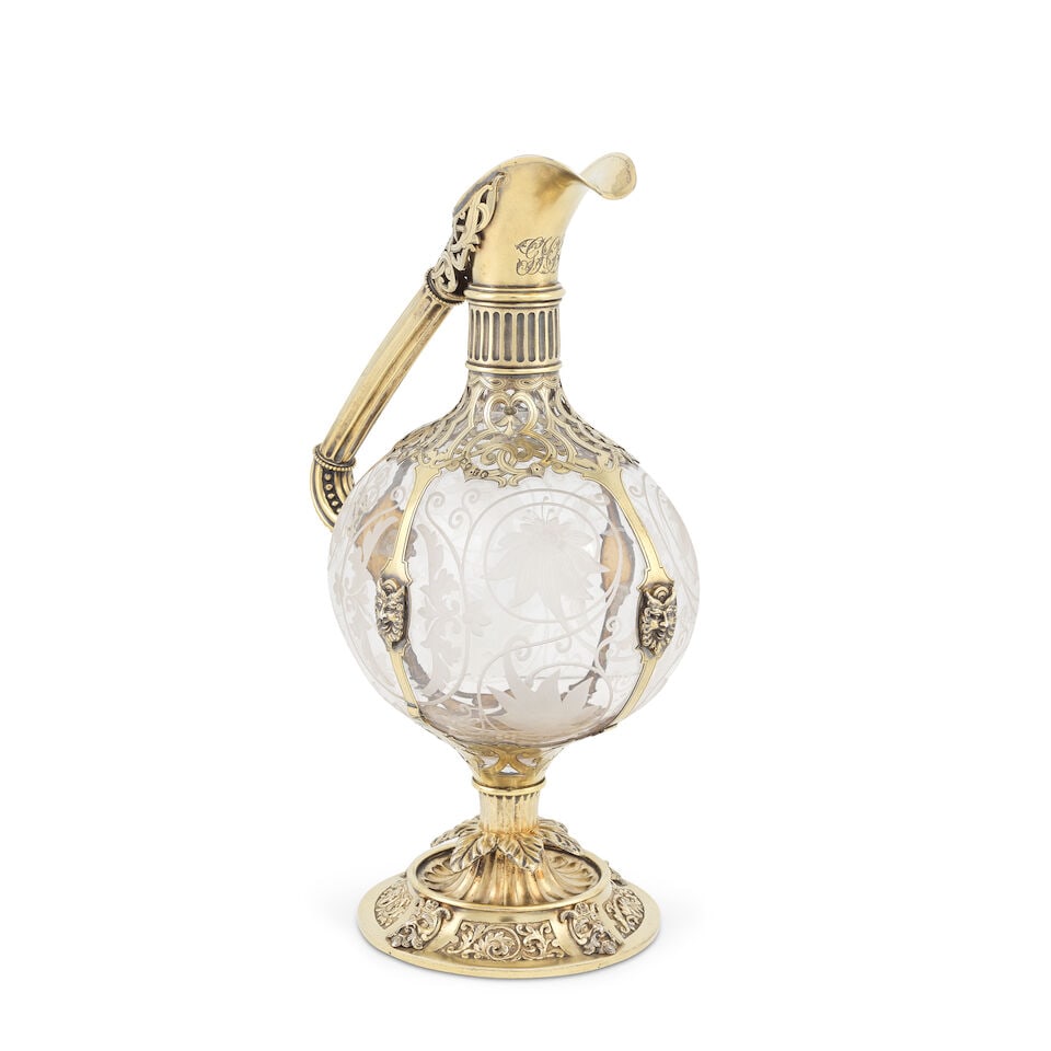 A cased unusual Victorian silver-gilt mounted glass claret jug Edward H Stockwell, London 1872 - 3