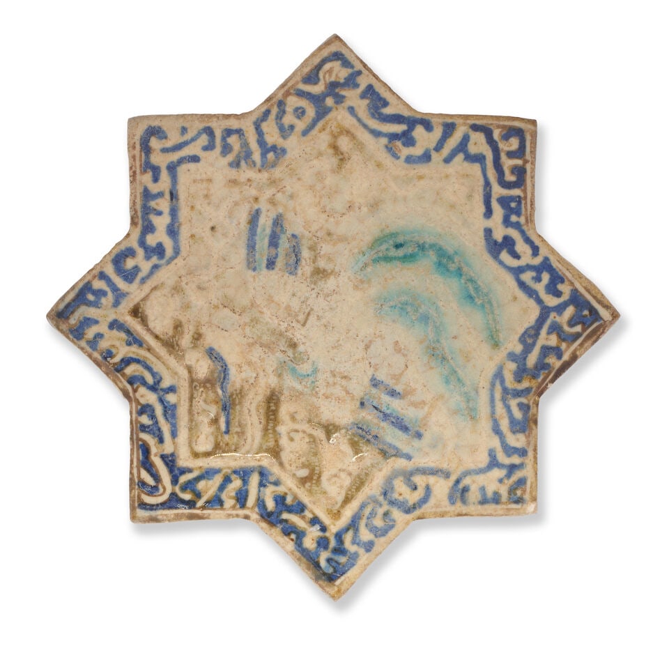 A Kashan lustre moulded pottery star tile Persia, late 13th/ early 14th Century (1 of 2)
