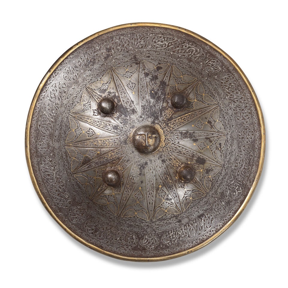 A Qajar gold damascened steel shield (sipar) Persia, 19th Century (1 of 3)