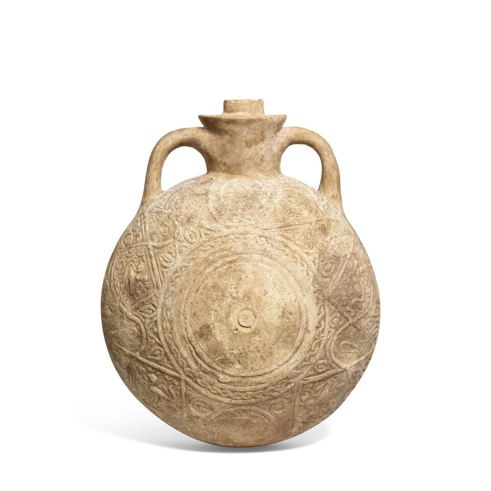 An unglazed moulded pottery pilgrim flask Persia, 12th/ 13th Century - 2