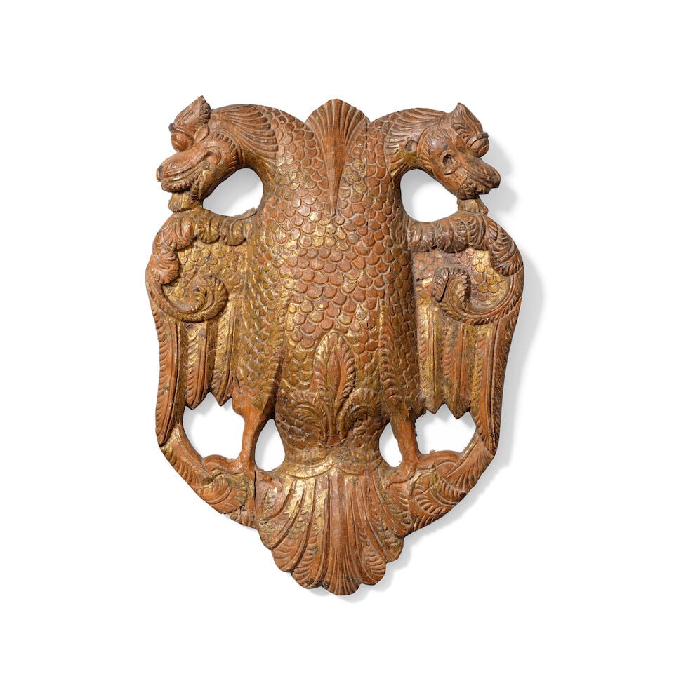 A carved gilt-wood coat of arms depicting Gandabherunda South India, probably Mysore, 18th Century (1 of 2)