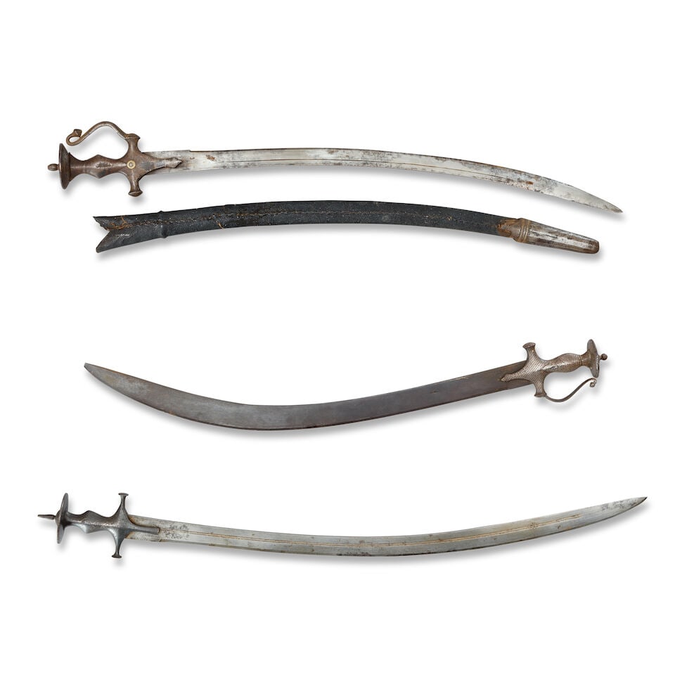 Two silver koftgari steel swords (tulwars) North India, 18th/ 19th Century(3) - 2