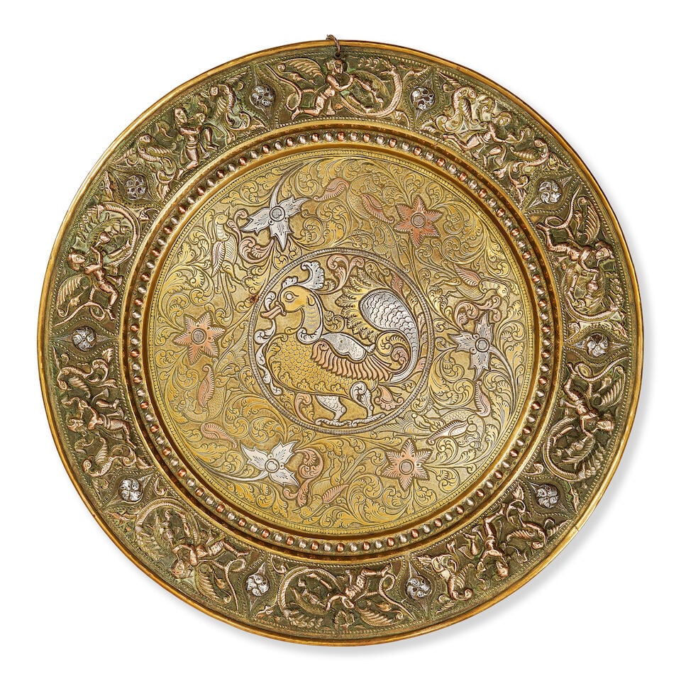 A repoussé silver and copper-overlaid brass tray Tanjore, 19th/ 20th Century (1 of 2)