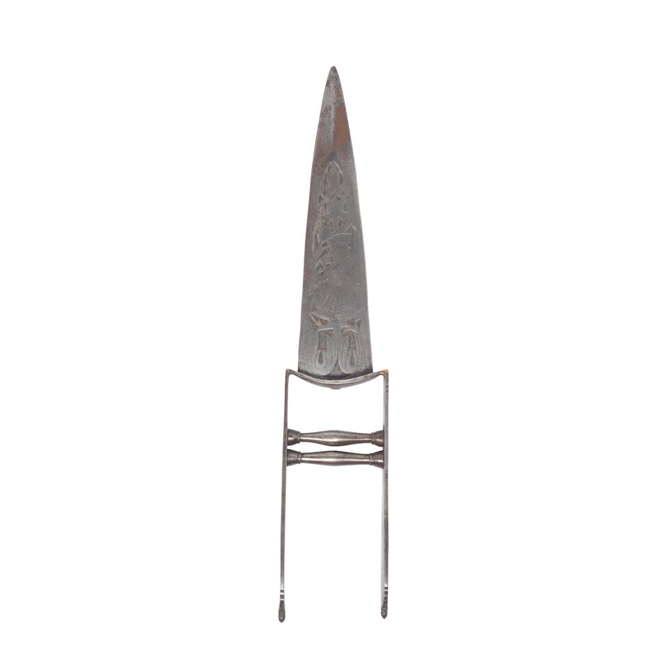 A steel push dagger (katar) India, 19th Century: A steel push dagger (katar) India, 19th Century the double-edged steel blade with armour piercing tip, recessed to each side and chiselled with a pair of confronting elephants to one side and a dancin