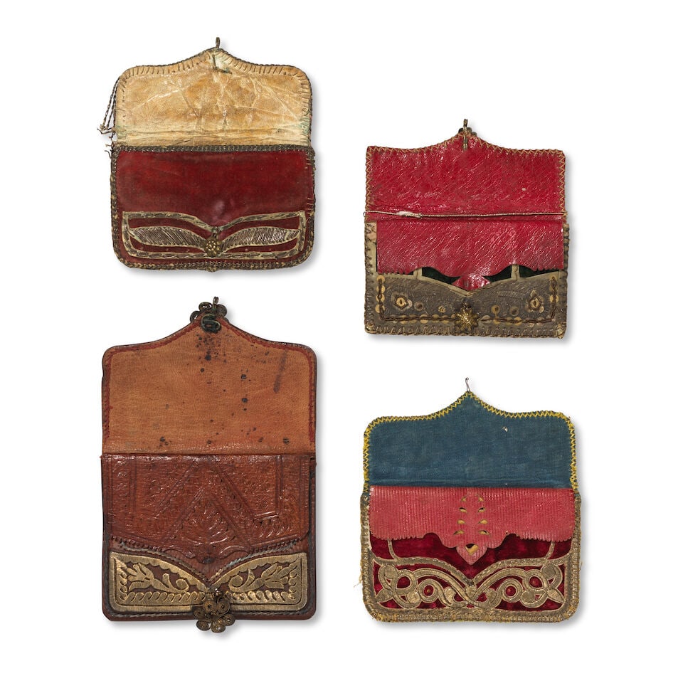 A group of four Ottoman metal-thread embroidered leather purses Turkey, 18th/ 19th Century(4) - 2