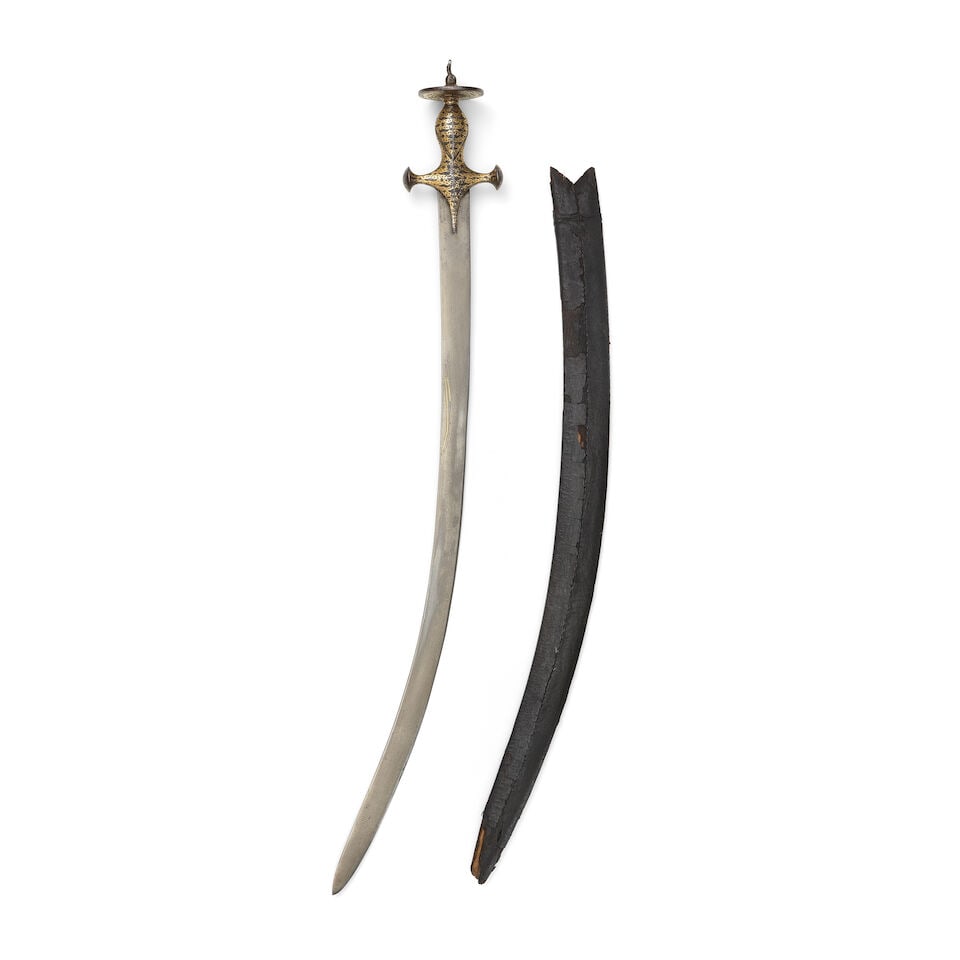 A gold koftgari hilted steel sword (tulwar) with bubri decoration India, 19th Century (1 of 4)
