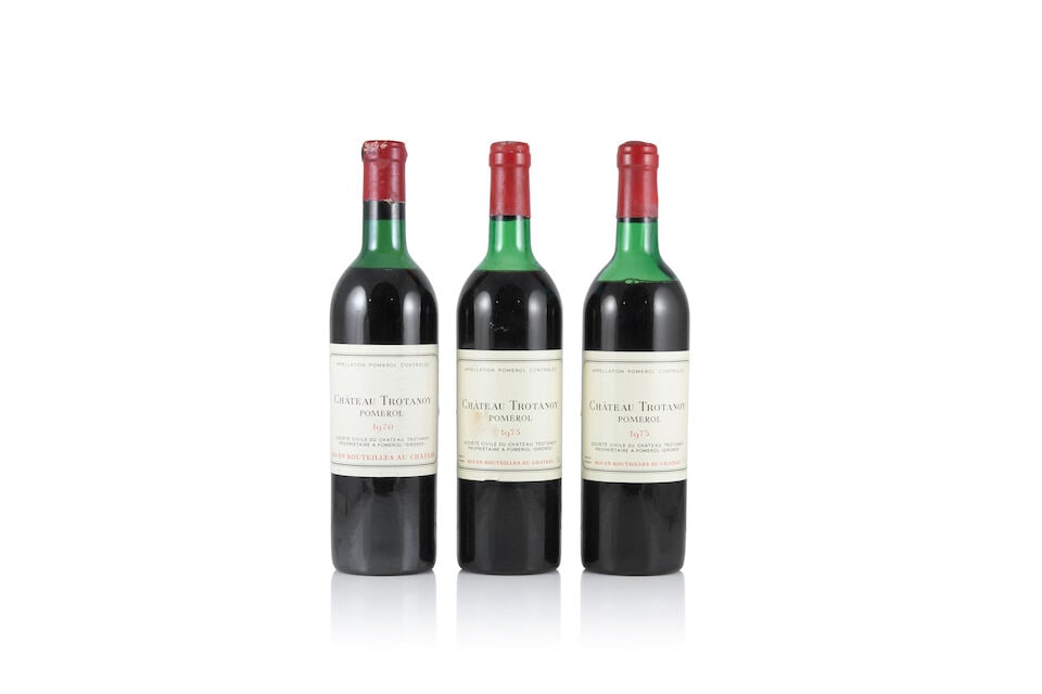 Château Trotanoy, 1970 (1 x 750ml) Château Trotanoy, 1975 (2 x 750ml): Château Trotanoy, 1970 (1 x 750ml) Region: Pomerol Fill Level: high shoulder Capsule: corroded with signs of old seepage Label: lightly bin-soiled & icked Château Trotanoy, 1975 (2 x 750ml)