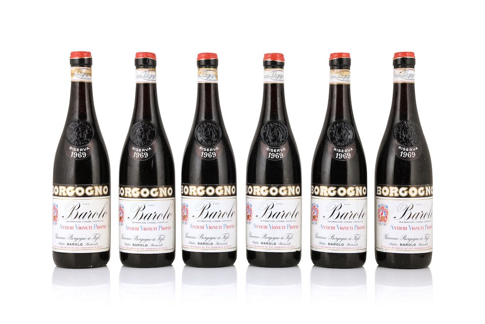 Borgogno, Barolo Riserva, 1969 (6 x 750ml): Borgogno, Barolo Riserva, 1969 (6 x 750ml) Region: Piedmont Fill Level: 2 at 4cm, 4 at 4.5cm Label: lightly bin-soiled, damp-affected and worn labels Packaging: badly damp affected and damaged origina
