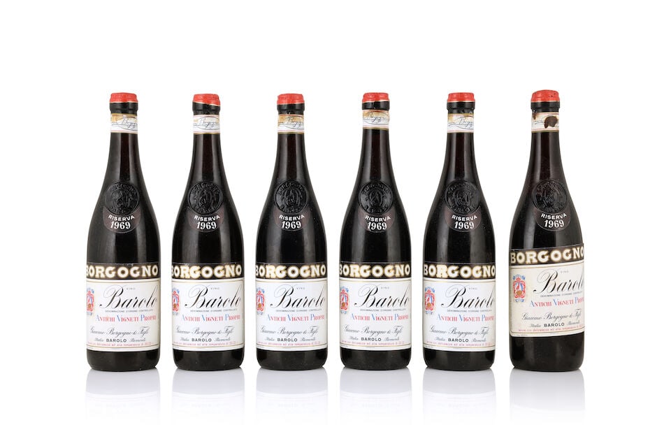 Borgogno, Barolo Riserva, 1969 (6 x 750ml): Borgogno, Barolo Riserva, 1969 (6 x 750ml) Region: Piedmont Fill Level: 4 at 4.5cm,1 at 5cm, 1 at 7cm below base of capsule Label: lightly bin-soiled, damp-affected and worn labels, 1