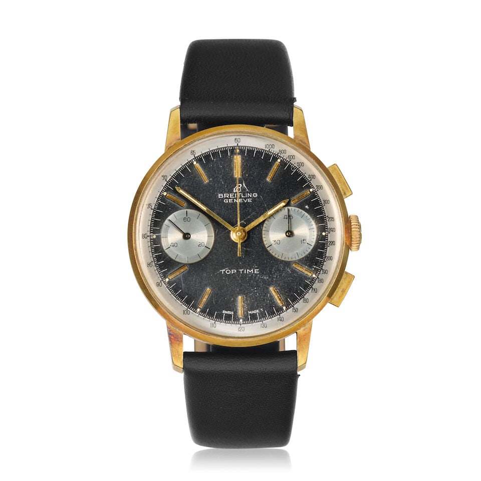 Breitling. A gold plated manual wind chronograph wristwatch Top Time, Ref: 2003, Circa 1971 (1 of 3)