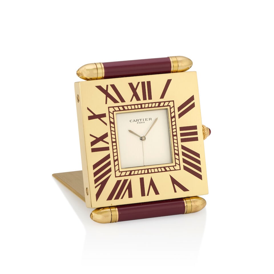 Cartier. A gilt and enamel quartz travel clock with alarm Quadrant, Circa 1980 (1 of 1)