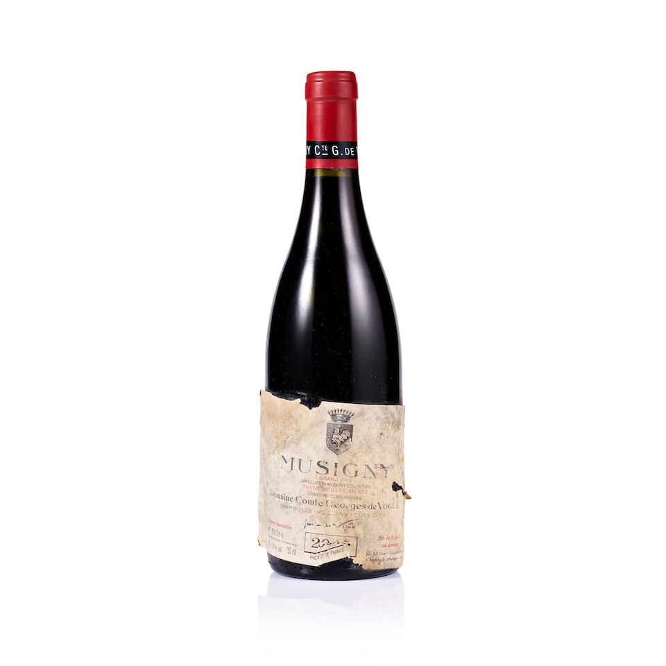 Domaine Comte Georges de Vogüé, Musigny, 2009 (1 x 750ml): Domaine Comte Georges de Vogüé, Musigny, 2009 (1 x 750ml) Region: Burgundy Fill Level: excellent Capsule: very slightly marked Cork: ok Label: badly damaged, torn, bin-soiled, stained & mark