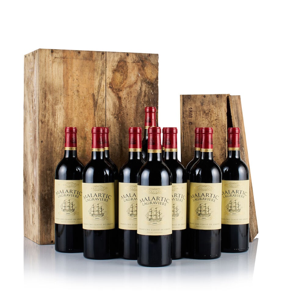 Château Malartic Lagravière, Pessac-Léognan, Grand Cru Classé, 2000 & 2005 (...: Château Malartic Lagravière, Pessac-Léognan, Grand Cru Classé, 2000 (1 x Magnum) Region: Bordeaux Fill Level: into neck Capsule: ok Cork: ok Label: scratched Packaging: individual