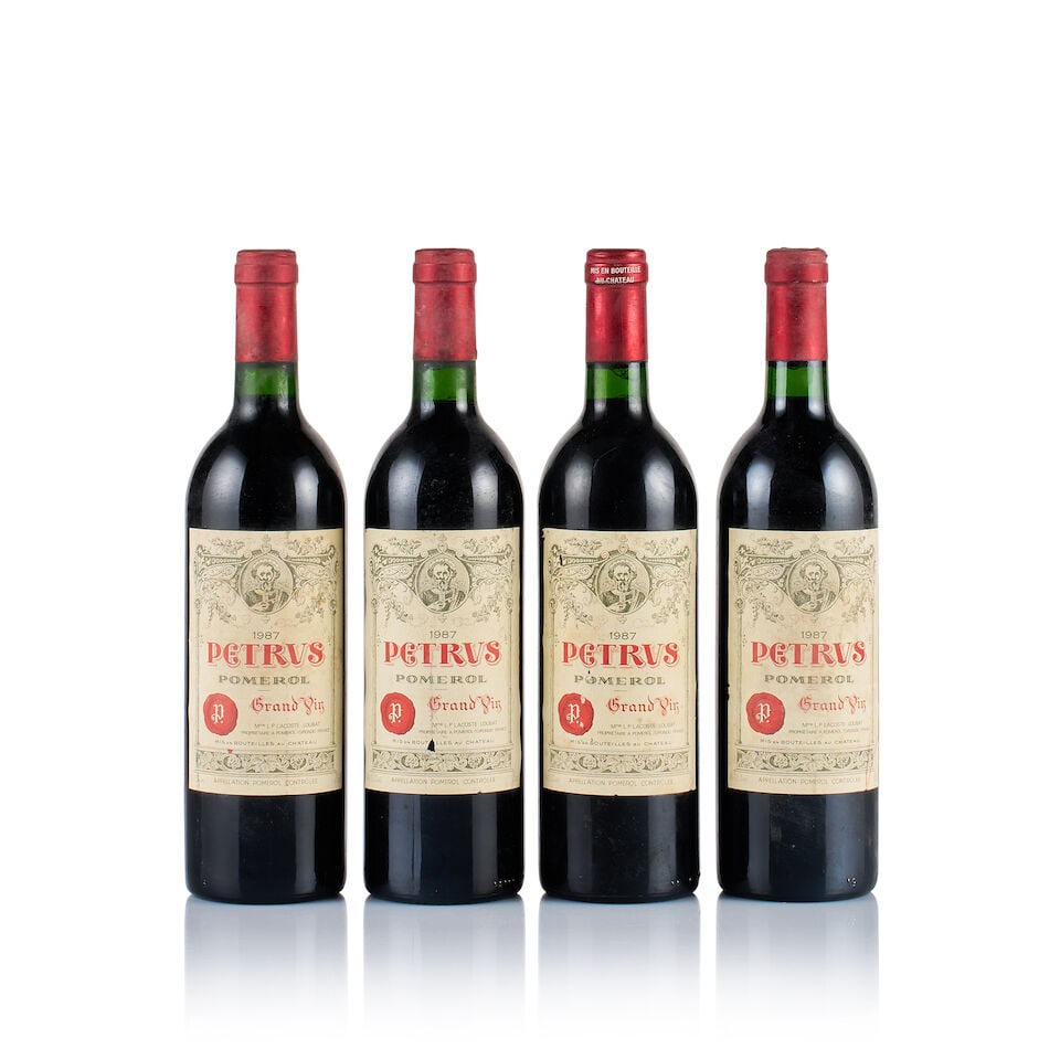 Pétrus, Pomerol, 1987 (4 x 750ml): Pétrus, Pomerol, 1987 (4 x 750ml) Region: Bordeaux Fill Level: into neck Capsule: all bin-soiled, 1x torn on top Cork: ok Label: all bin-soiled, 1x marked, 2x nicked Packaging: neutral carton Thi