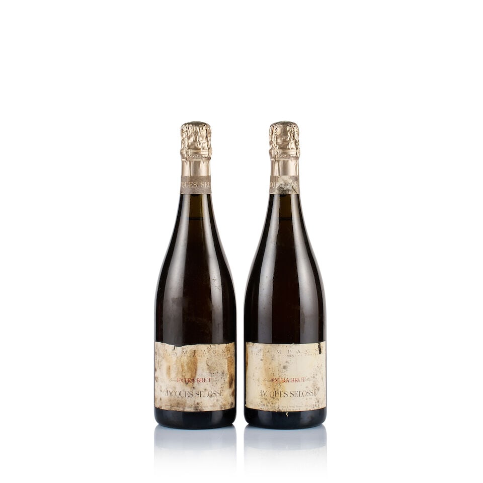 Champagne Jacques Selosse, Grand Cru Blanc de Blancs, Extra Brut (2 x 750ml): Champagne Jacques Selosse, Grand Cru Blanc de Blancs, Extra Brut (2 x 750ml) Region: Champagne Fill Level: 2x under 2.5cm below base of foils Capsule: ok Cork: ok Label: 2x badly stained, badly damp-a