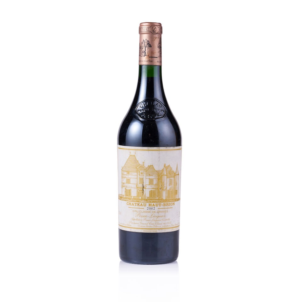 Château Haut-Brion, Pessac-Léognan, 1er Grand Cru Classé, 2002 (1 x 750ml): Château Haut-Brion, Pessac-Léognan, 1er Grand Cru Classé, 2002 (1 x 750ml) Region: Bordeaux Fill Level: excellent level Capsule: ok Cork: ok Label: stained, marked and bin-soiled Packag