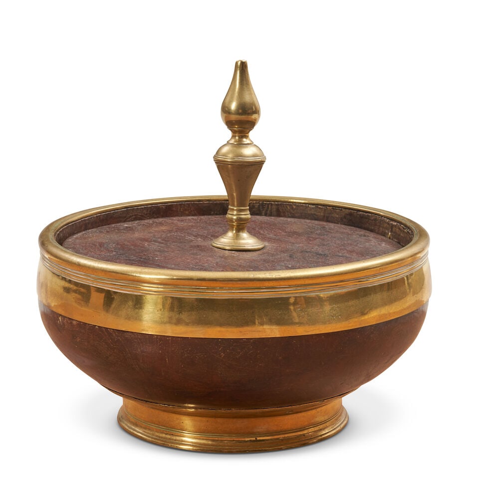 George III Brass Bound Mahogany Cellarette, England, early 19th century,: George III Brass Bound Mahogany Cellarette, England, early 19th century, cylindrical footed bowl shape with flat cover and turned finial, dia. 11, overall ht. 10, bowl ht. 5 1/2 in. For further inform