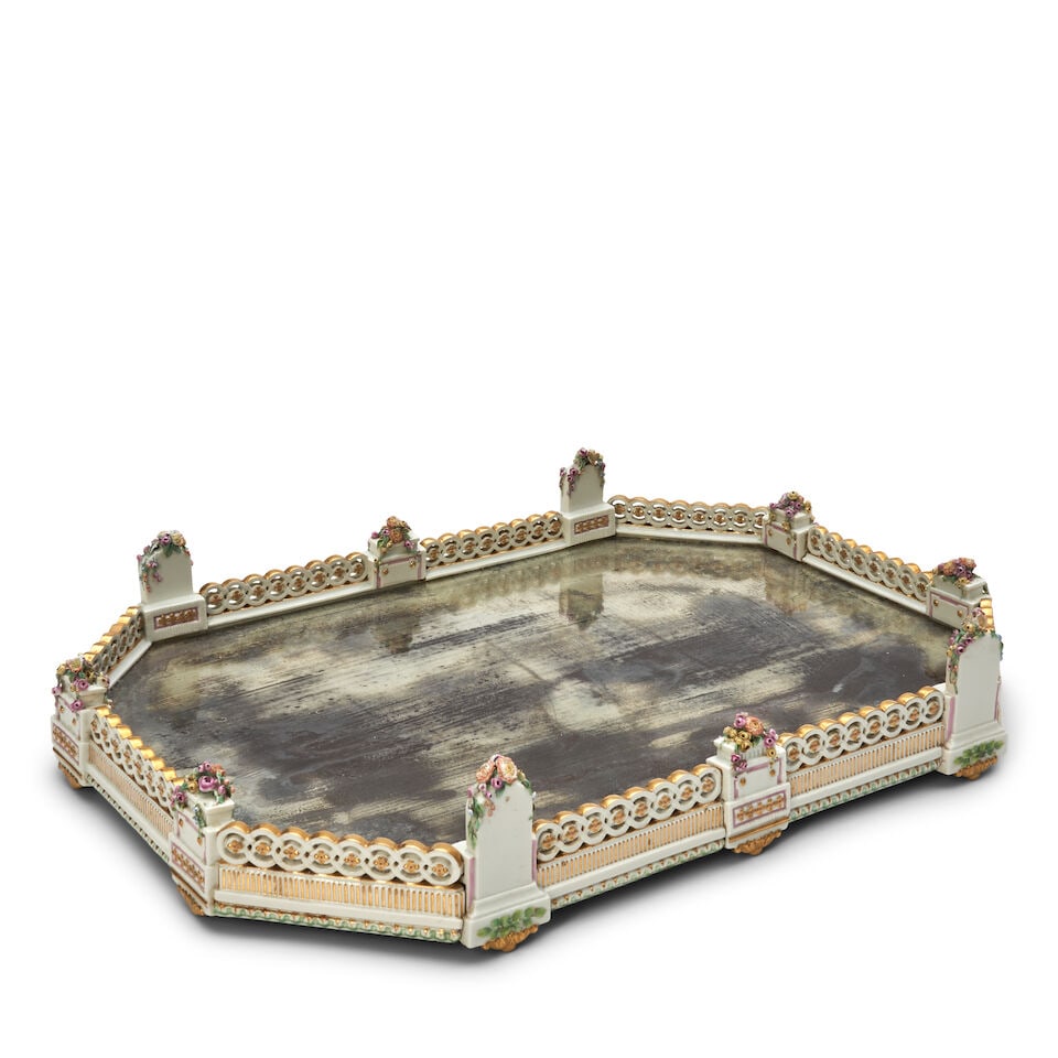 Continental Porcelain and Mirrored Plateau, 19th century,: Continental Porcelain and Mirrored Plateau, 19th century, octagonal shape with pierced gallery, gilded and polychrome enameled alternating monument shapes adorned with flowers, lg. 20 1/2, wd. 14