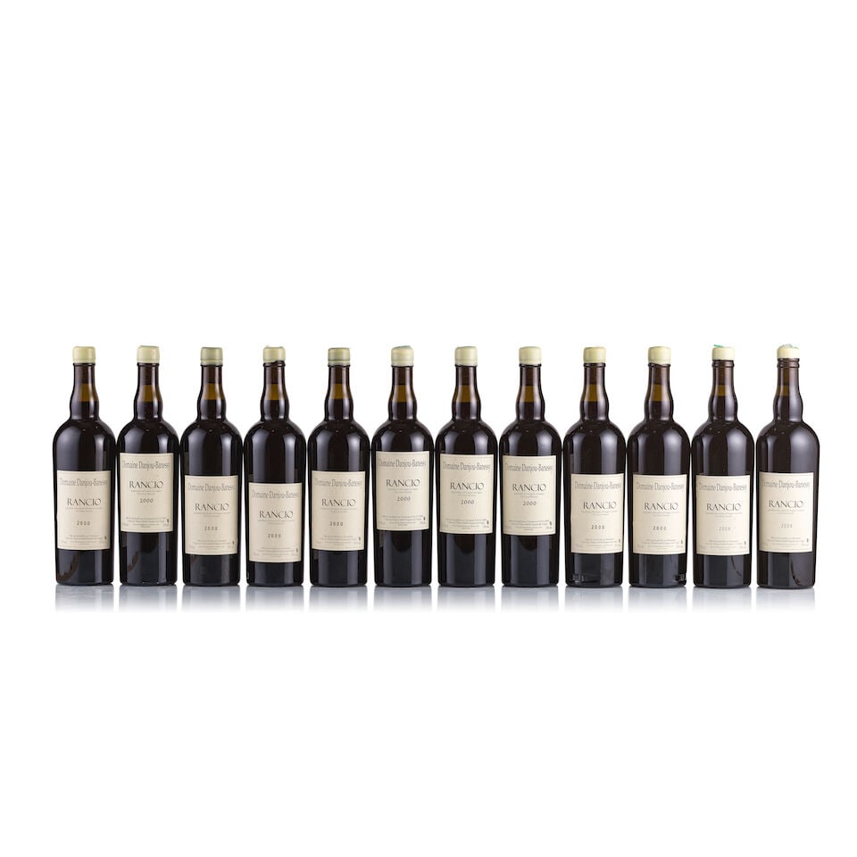 Domaine Danjou-Bannessy, Rivesaltes Rancio, 2000 & 2004 (12 x 750ml): Domaine Danjou-Bannessy, Rivesaltes Rancio, 2000 (10 x 750ml) Region: Roussillon Fill Level: into neck Capsule: white wax, ok Cork: ok Label: good appearance Packaging: neutral carton Domaine