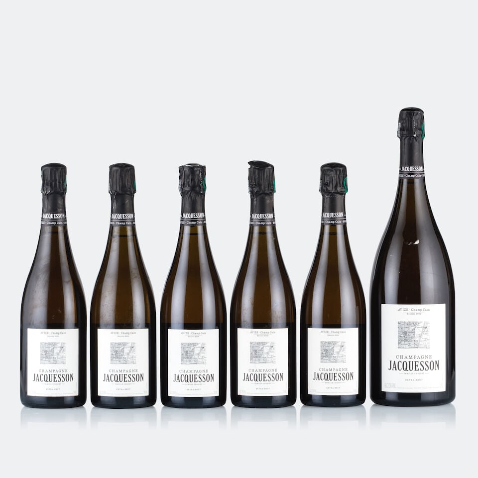 Champagne Jacquesson, Avize, Champ Caïn, 2005 (5 x 750ml & 1 x Magnum): Champagne Jacquesson, Avize, Champ Caïn, 2005 (5 x 750ml) Region: Champagne Fill Level: excellent Capsule: 4x ok, 1x cut at the top Cork: ok Label: 2x slightly worn and bin-soiled Packaging: 4x i