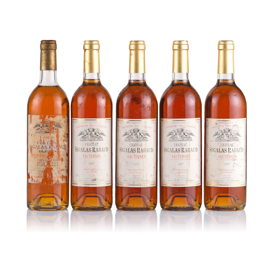 Château Sigalas Rabaud, Sauternes, 1983 & 1997 (5 x 750ml): Château Sigalas Rabaud, Sauternes, 1983 (1 x 750ml) Region: Sauternes Fill Level: top shoulder Capsule: badly stained and corroded Cork: very slightly depressed Label: torn, scratched and bin-soi